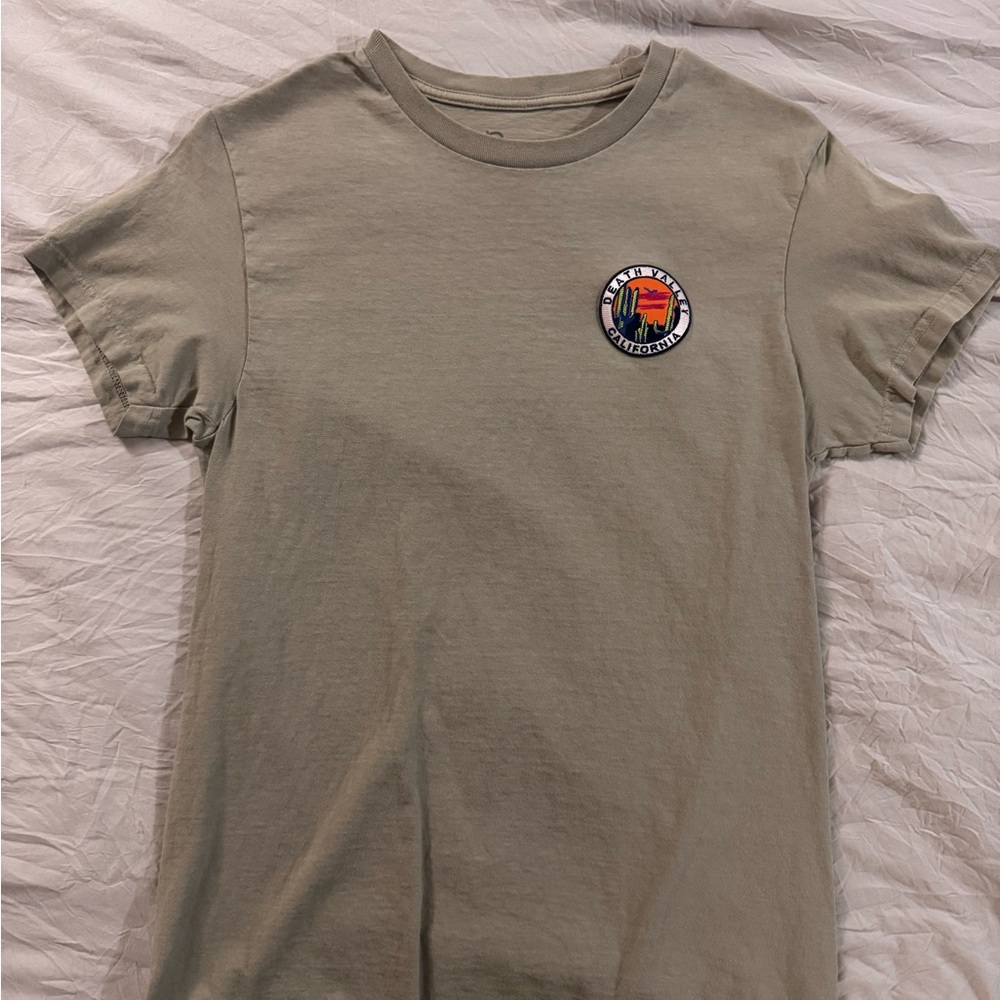 Beige T-Shirt with Colorful Patch